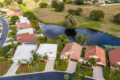 Beautiful Lakeside Pool home in a HIGHLY DESIRABLE community on Greenview Cove Golf Club in Florida - for sale on GolfHomes.com, golf home, golf lot