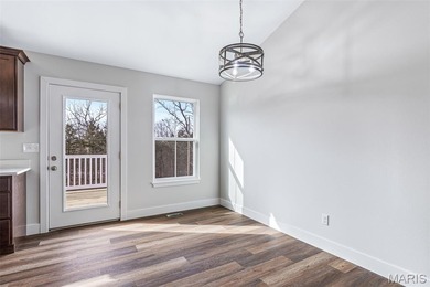 Charming brand new 3 bed, 2 bath home ideally located within on Terre Du Lac Golf and Country Club in Missouri - for sale on GolfHomes.com, golf home, golf lot