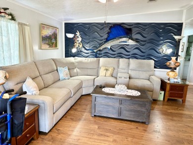 Situated on a spacious corner lot, this home features an on Lake Fairways Country Club in Florida - for sale on GolfHomes.com, golf home, golf lot