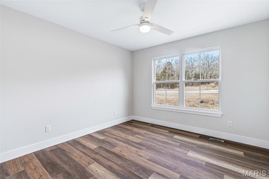 Charming brand new 3 bed, 2 bath home ideally located within on Terre Du Lac Golf and Country Club in Missouri - for sale on GolfHomes.com, golf home, golf lot