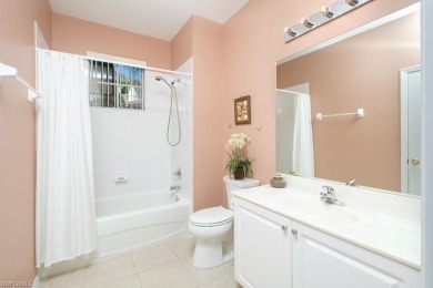 Spacious and bright end unit with 3 bedrooms and 2 bathrooms and on Naples Lakes Country Club in Florida - for sale on GolfHomes.com, golf home, golf lot