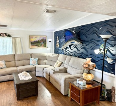 Situated on a spacious corner lot, this home features an on Lake Fairways Country Club in Florida - for sale on GolfHomes.com, golf home, golf lot
