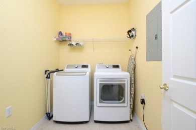 Spacious and bright end unit with 3 bedrooms and 2 bathrooms and on Naples Lakes Country Club in Florida - for sale on GolfHomes.com, golf home, golf lot