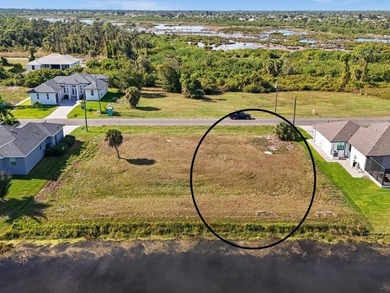 Build your Florida dream home on this cleared canal-front on Rotonda Golf and Country Club - Long Marsh  in Florida - for sale on GolfHomes.com, golf home, golf lot