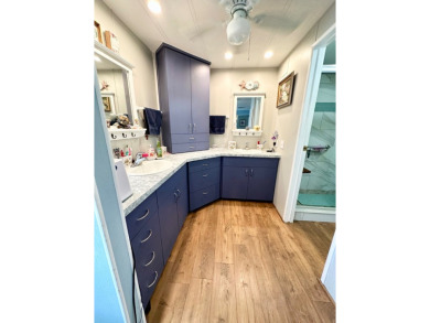 Situated on a spacious corner lot, this home features an on Lake Fairways Country Club in Florida - for sale on GolfHomes.com, golf home, golf lot