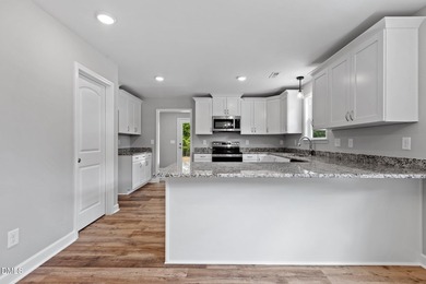 COMING APRIL 2026!!***ALL PICS FROM PREVIOUS BUILD! CHARMING NEW on River Golf and Country Club at Lake Royale in North Carolina - for sale on GolfHomes.com, golf home, golf lot