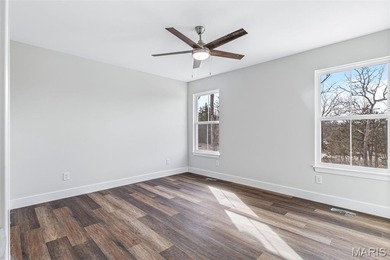 Charming brand new 3 bed, 2 bath home ideally located within on Terre Du Lac Golf and Country Club in Missouri - for sale on GolfHomes.com, golf home, golf lot