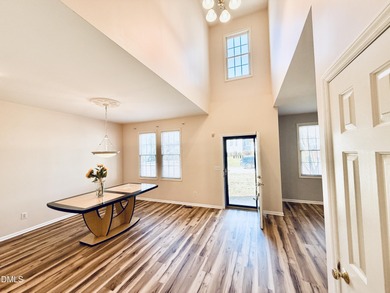 Welcome home to this beautifully maintained 3,061 sq ft on TPC at Wakefield Plantation in North Carolina - for sale on GolfHomes.com, golf home, golf lot