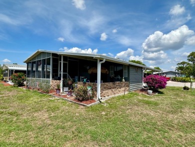 Situated on a spacious corner lot, this home features an on Lake Fairways Country Club in Florida - for sale on GolfHomes.com, golf home, golf lot