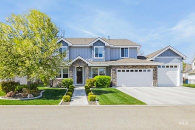 This stunning, custom-built home features both a primary and on Hunters Point Golf Club in Idaho - for sale on GolfHomes.com, golf home, golf lot