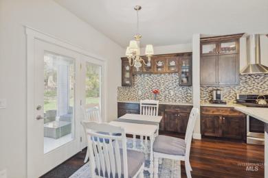 This stunning, custom-built home features both a primary and on Hunters Point Golf Club in Idaho - for sale on GolfHomes.com, golf home, golf lot
