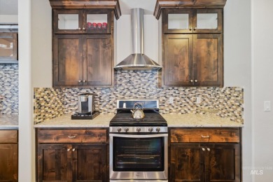 This stunning, custom-built home features both a primary and on Hunters Point Golf Club in Idaho - for sale on GolfHomes.com, golf home, golf lot