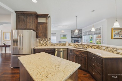 This stunning, custom-built home features both a primary and on Hunters Point Golf Club in Idaho - for sale on GolfHomes.com, golf home, golf lot