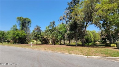 Welcome to Nature's Paradise with this extraordinary 2/3 acre on Queens Harbour Yacht and Country Club in Florida - for sale on GolfHomes.com, golf home, golf lot