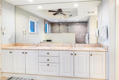 Perched high on the 12th floor in Jasmine Bay South, this on West Bay Beach and Golf Club in Florida - for sale on GolfHomes.com, golf home, golf lot