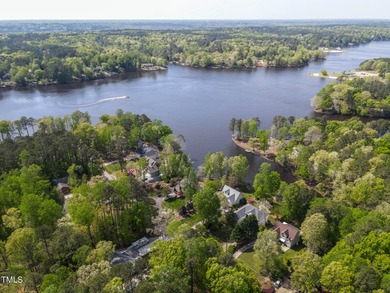 Priced to Sell! Stunning Waterfront Home on Rare Double Lot in on River Golf and Country Club at Lake Royale in North Carolina - for sale on GolfHomes.com, golf home, golf lot