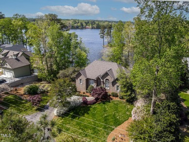 Priced to Sell! Stunning Waterfront Home on Rare Double Lot in on River Golf and Country Club at Lake Royale in North Carolina - for sale on GolfHomes.com, golf home, golf lot