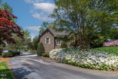 Priced to Sell! Stunning Waterfront Home on Rare Double Lot in on River Golf and Country Club at Lake Royale in North Carolina - for sale on GolfHomes.com, golf home, golf lot