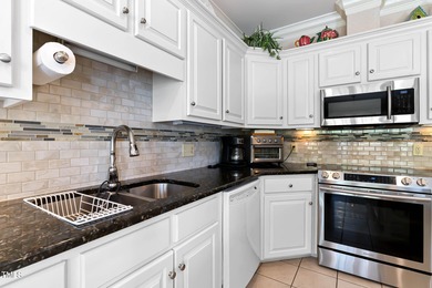 Priced to Sell! Stunning Waterfront Home on Rare Double Lot in on River Golf and Country Club at Lake Royale in North Carolina - for sale on GolfHomes.com, golf home, golf lot