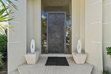 Spectacular 4 bedroom, 4.5 bathroom residence in the prestigious on BallenIsles Golf and Country Club in Florida - for sale on GolfHomes.com, golf home, golf lot