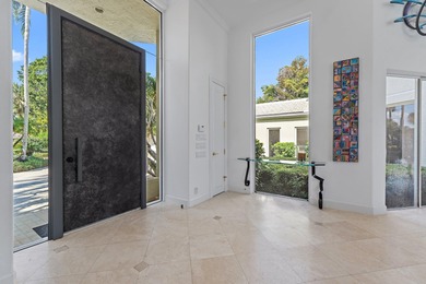 Spectacular 4 bedroom, 4.5 bathroom residence in the prestigious on BallenIsles Golf and Country Club in Florida - for sale on GolfHomes.com, golf home, golf lot