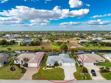 A Poolside Retreat with Peaceful Canal Views in Rotonda West's on Pinemoor West Golf Club in Florida - for sale on GolfHomes.com, golf home, golf lot