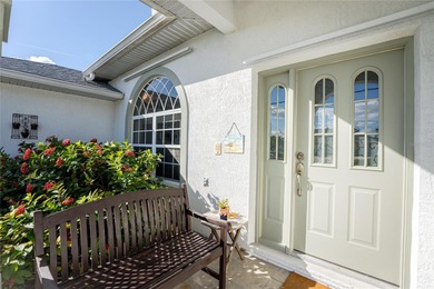 A Poolside Retreat with Peaceful Canal Views in Rotonda West's on Pinemoor West Golf Club in Florida - for sale on GolfHomes.com, golf home, golf lot