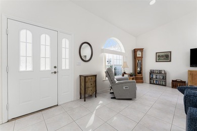 A Poolside Retreat with Peaceful Canal Views in Rotonda West's on Pinemoor West Golf Club in Florida - for sale on GolfHomes.com, golf home, golf lot