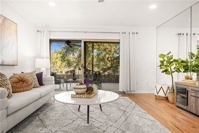 Wonderful opportunity to own this ground-level condo overlooking on El Niguel Country Club in California - for sale on GolfHomes.com, golf home, golf lot