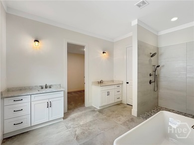 Discover effortless coastal living in this beautifully crafted on The Golf Club At Sanctuary Cove in Georgia - for sale on GolfHomes.com, golf home, golf lot