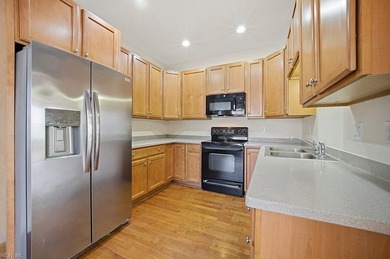 Welcome to this beautiful 3-bedroom, end unit townhome, located on Riverfront Golf Club in Virginia - for sale on GolfHomes.com, golf home, golf lot