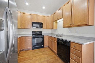 Welcome to this beautiful 3-bedroom, end unit townhome, located on Riverfront Golf Club in Virginia - for sale on GolfHomes.com, golf home, golf lot