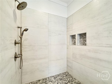 Discover effortless coastal living in this beautifully crafted on The Golf Club At Sanctuary Cove in Georgia - for sale on GolfHomes.com, golf home, golf lot