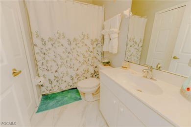 Cornered 3 bedroom/2 bath condo unit. New tile flooring on Majestic Golf Club in Florida - for sale on GolfHomes.com, golf home, golf lot