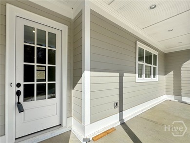 Discover effortless coastal living in this beautifully crafted on The Golf Club At Sanctuary Cove in Georgia - for sale on GolfHomes.com, golf home, golf lot