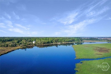 Discover effortless coastal living in this beautifully crafted on The Golf Club At Sanctuary Cove in Georgia - for sale on GolfHomes.com, golf home, golf lot