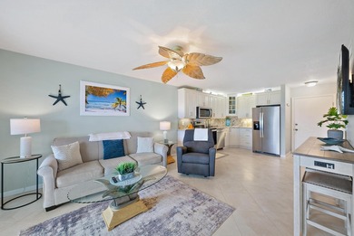 Enjoy stunning ocean and golf course views from this beautifully on Ocean Village Golf Course in Florida - for sale on GolfHomes.com, golf home, golf lot