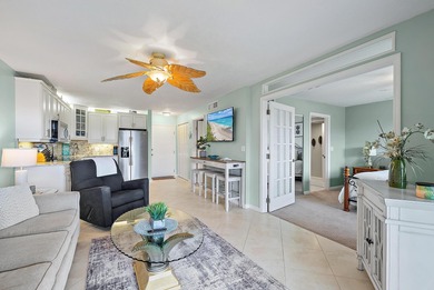 Enjoy stunning ocean and golf course views from this beautifully on Ocean Village Golf Course in Florida - for sale on GolfHomes.com, golf home, golf lot