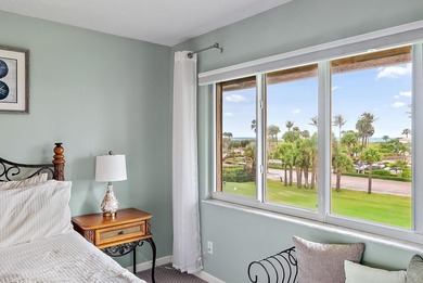 Enjoy stunning ocean and golf course views from this beautifully on Ocean Village Golf Course in Florida - for sale on GolfHomes.com, golf home, golf lot