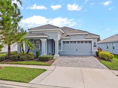FULL GOLF & TENNIS MEMBERSHP INCLUDED.  Step into luxury living on The Oasis Club at Champions Gate in Florida - for sale on GolfHomes.com, golf home, golf lot