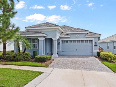FULL GOLF & TENNIS MEMBERSHP INCLUDED.  Step into luxury living on The Oasis Club at Champions Gate in Florida - for sale on GolfHomes.com, golf home, golf lot