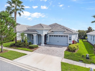 FULL GOLF & TENNIS MEMBERSHP INCLUDED.  Step into luxury living on The Oasis Club at Champions Gate in Florida - for sale on GolfHomes.com, golf home, golf lot