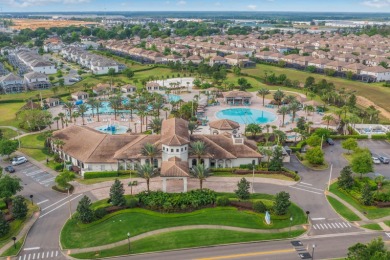 FULL GOLF & TENNIS MEMBERSHP INCLUDED.  Step into luxury living on The Oasis Club at Champions Gate in Florida - for sale on GolfHomes.com, golf home, golf lot