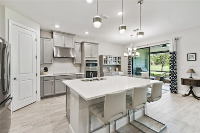 This gorgeous and highly sought-after Brava model, BUILT IN 2022 on Stonegate Golf Club in Florida - for sale on GolfHomes.com, golf home, golf lot