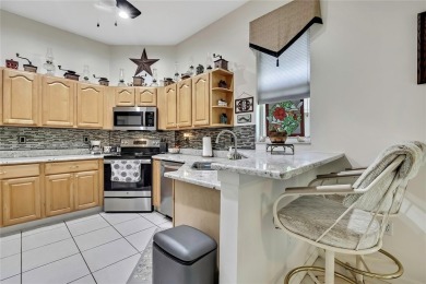 Such a beautiful home to enjoy from the gorgeous front door, and on Glen Lakes Country Club in Florida - for sale on GolfHomes.com, golf home, golf lot