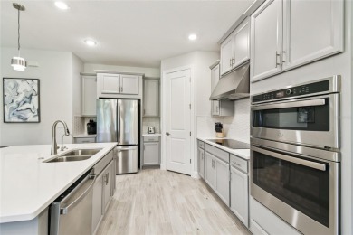 This gorgeous and highly sought-after Brava model, BUILT IN 2022 on Stonegate Golf Club in Florida - for sale on GolfHomes.com, golf home, golf lot