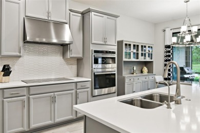 This gorgeous and highly sought-after Brava model, BUILT IN 2022 on Stonegate Golf Club in Florida - for sale on GolfHomes.com, golf home, golf lot