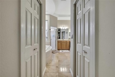 Such a beautiful home to enjoy from the gorgeous front door, and on Glen Lakes Country Club in Florida - for sale on GolfHomes.com, golf home, golf lot