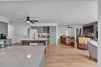 116 Spyglass Hill offers a rarely seen sizable and renovated on Pocono Farms Country Club in Pennsylvania - for sale on GolfHomes.com, golf home, golf lot