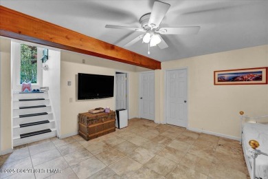 116 Spyglass Hill offers a rarely seen sizable and renovated on Pocono Farms Country Club in Pennsylvania - for sale on GolfHomes.com, golf home, golf lot